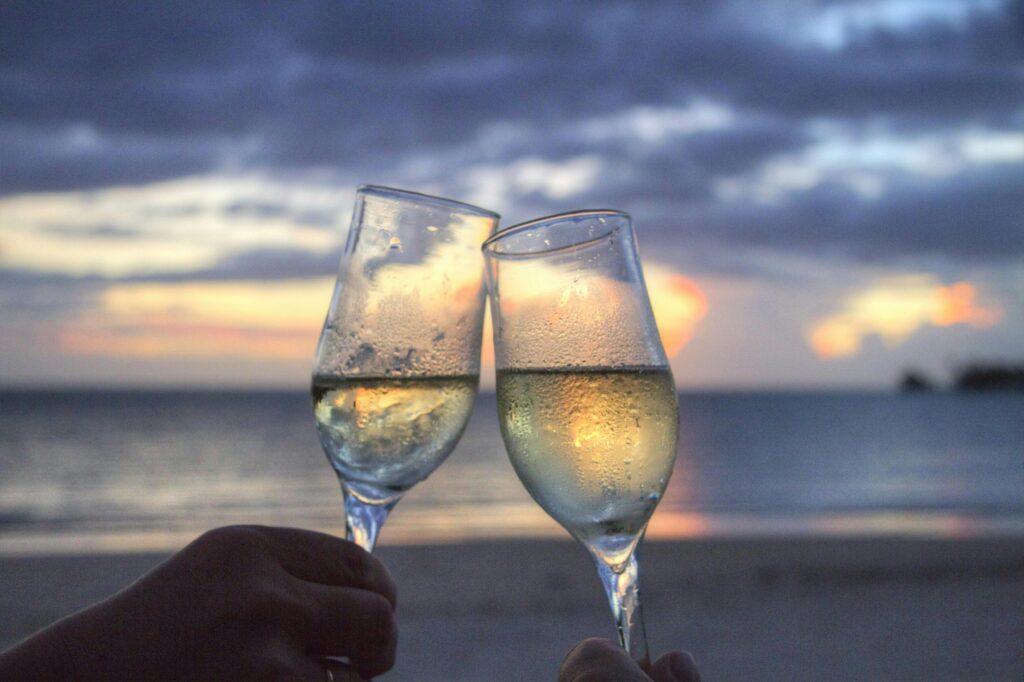 clinking chilled wine glasses