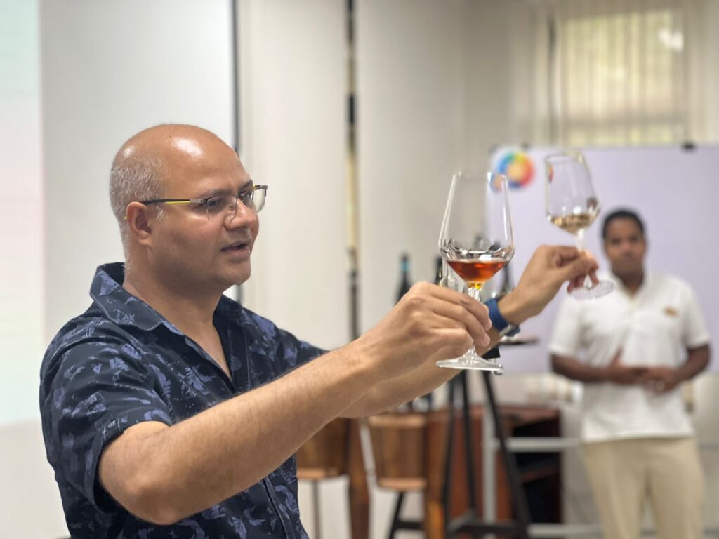 Master Sommelier Kamal Malik analysing wines