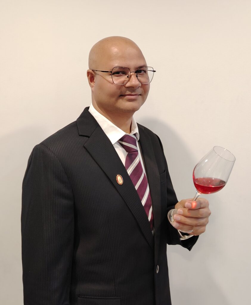 kamal-malik-ms-with-wine-glass