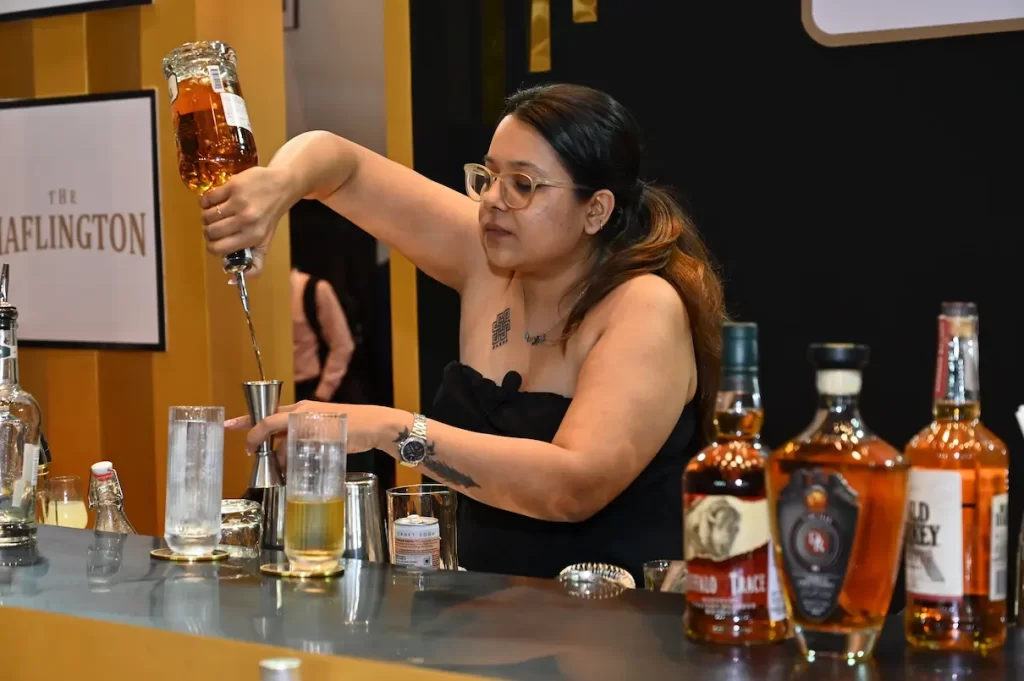 A Bartender making a cocktail at Prowine Mumbai