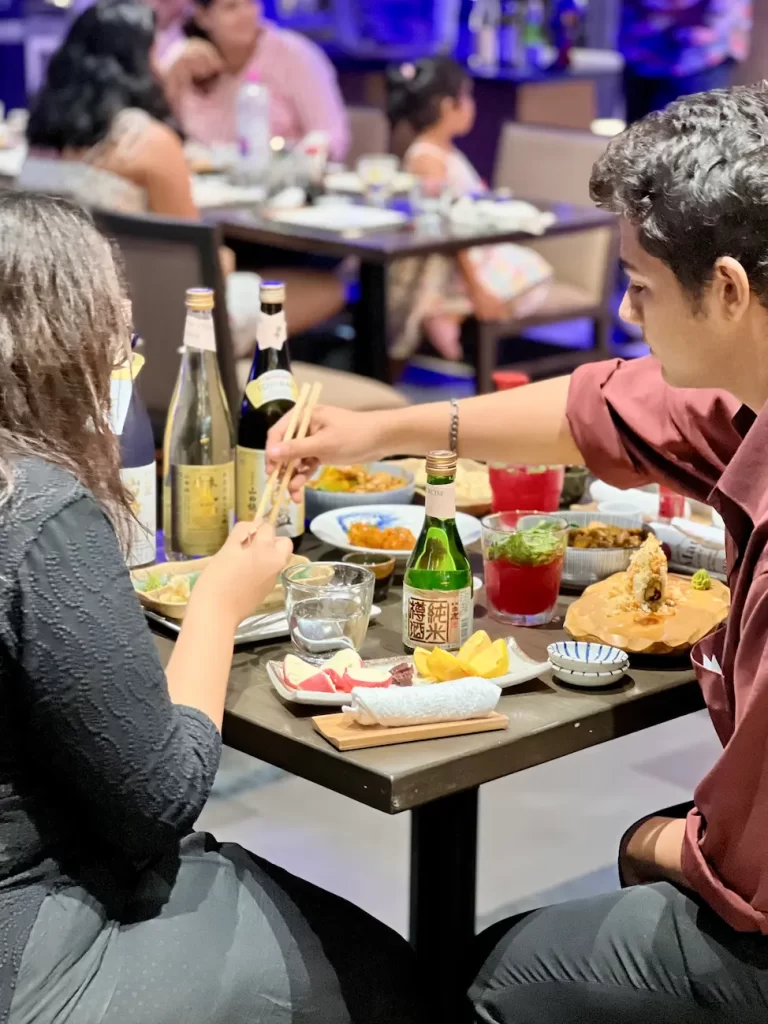 Diners at an upscale Japanese restaurant in Mumbai