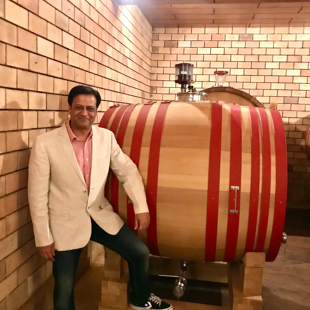 Ravi Joshi In front of a 2000L Foudre at Grover Zampa winery in Nandi Hills, Bangalore
